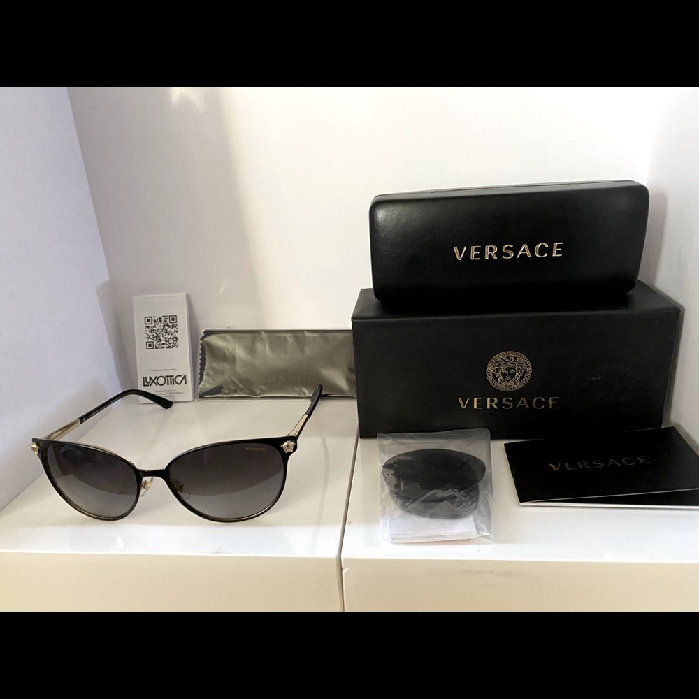 Brand new pair of Luxury sunglasses from the house of Versace.
